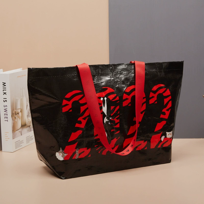 Портативный жаккардовый внешней торговли PP сплетенный мешок Пленочный мешок может быть настроен логотип портативный сплетенный мешок сумка из змеиной кожи