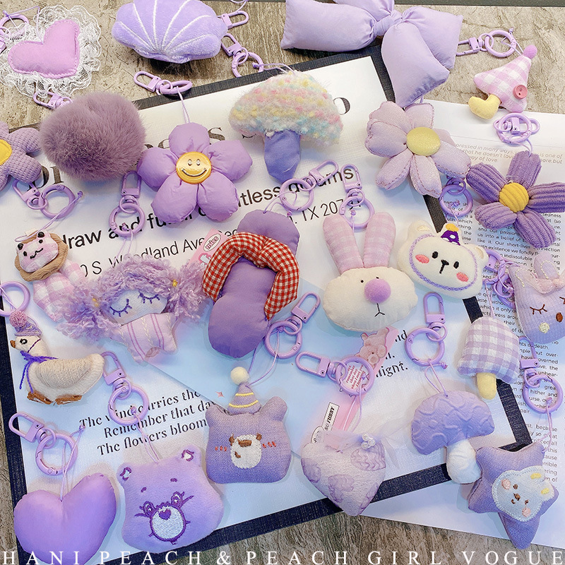 HD843A025 tela de otoño púrpura relleno de algodón muñeca llavero colgante bolso colgante de teléfono móvil