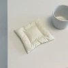 Yellow grid quilted coaster
