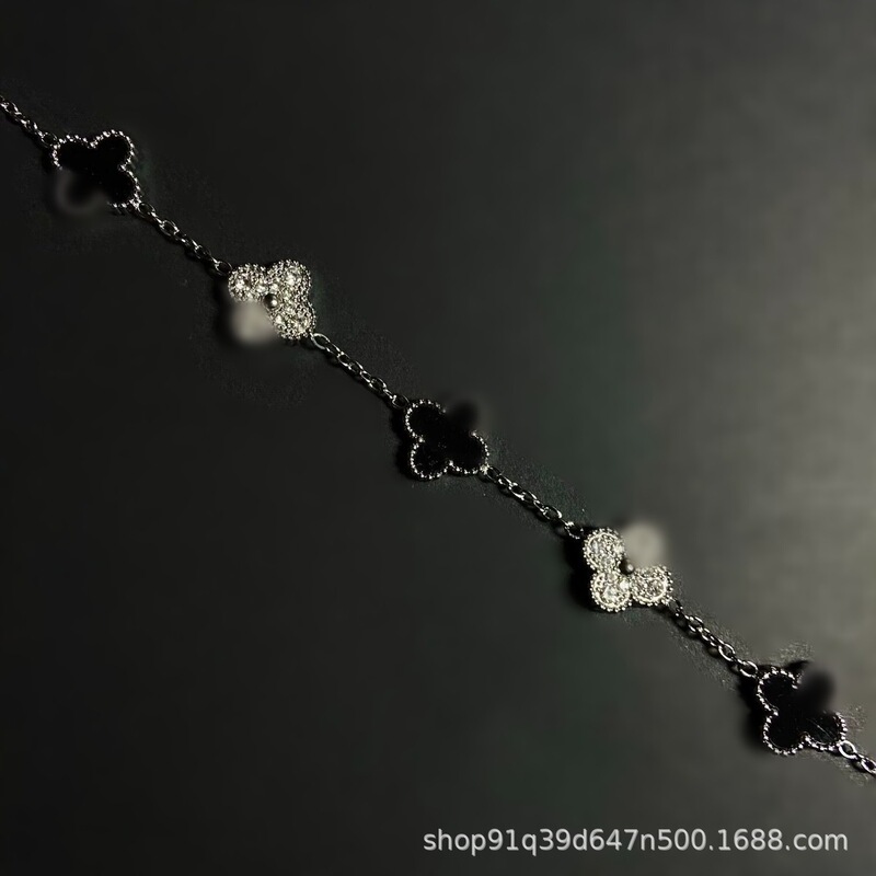Four-Leaf Clover Bracelet for Women, Light Luxury, High-End Niche Design, Flower Zircon, Versatile Black and White Panda Style Bracelet Chain Wholesale Four-Leaf Clover Bracelet for Women, Light Luxury, High-End Niche Design, Flower Zircon, Versatile Black and White Panda Style Bracelet Chain Wholesale