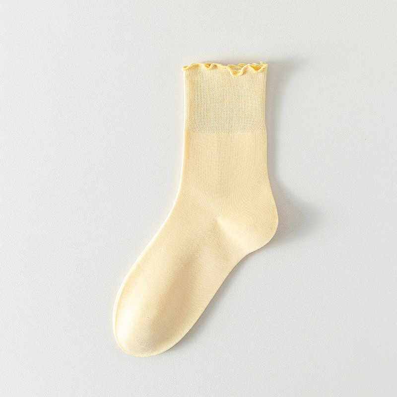 Calcetines de algodón de color sólido para mujeres verano en una máquina sin costuras de hueso envasado independiente calcetines de mujer al por mayor