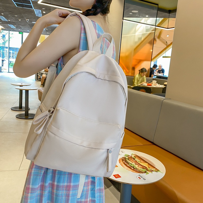 Comercio exterior al por mayor 2023 nueva mochila coreana de nailon para estudiantes de secundaria