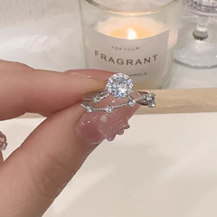 輝く星の指輪の女性のタイプの小さい大衆の軽豪華な高級感のシミュレーションのダイヤモンドの莫桑石のプロポーズのダイヤモンドリングの活動口は調節することができます。