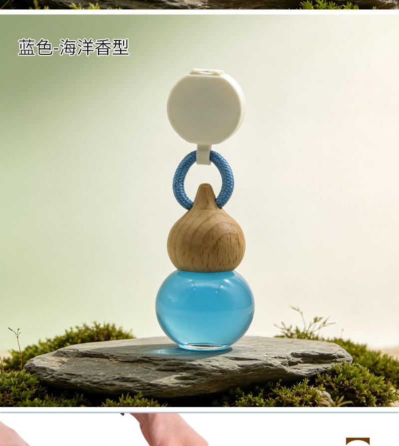 Car air freshener, car perfume pendant, gourd-shaped glass bottle, eliminates odors inside the car, provides long-lasting fragrance, a luxurious car accessory