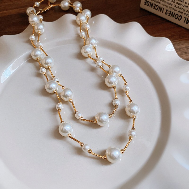 Collar con cuentas de perlas de gota de agua con diamantes transfronterizos otoño e invierno cadena de suéter de lujo ligero francés moda todo fósforo joyería de alta gama