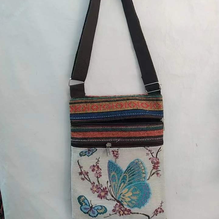 Estilo étnico bordado elefante dibujos animados bolsa de mensajero Dai bolsa de hombro de viaje de las mujeres teléfono móvil bolsa de hombro lateral