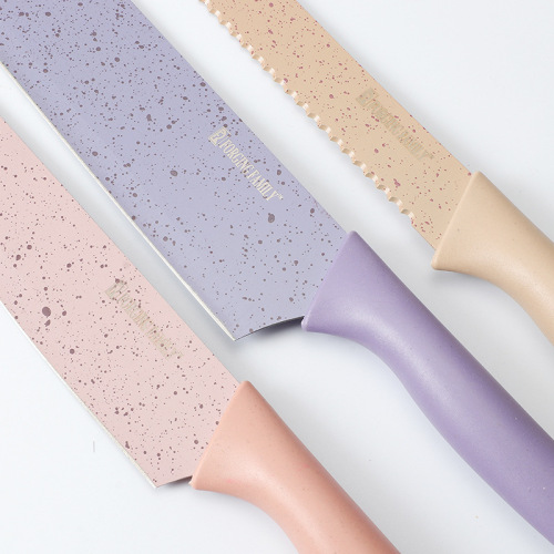 A set of 6 colorful wheat straw kitchen knives, including a chef's knife and a meat knife, presented in a gift box for home use.