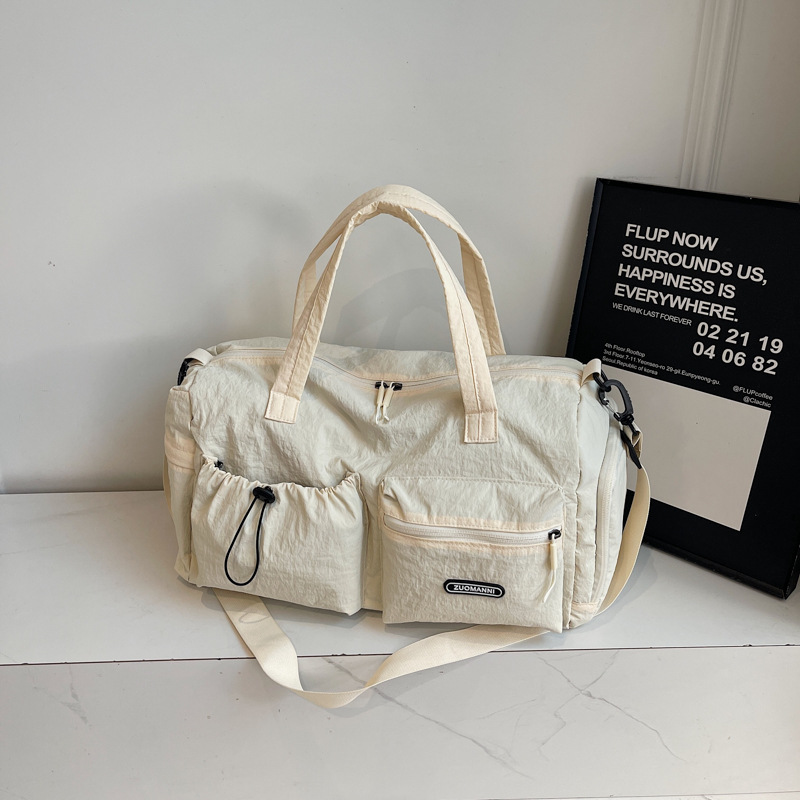 2025 nueva bolsa de viaje de gran capacidad para mujeres ligera separación seca y húmeda nadadora bolsa de equipaje de gimnasio portátil