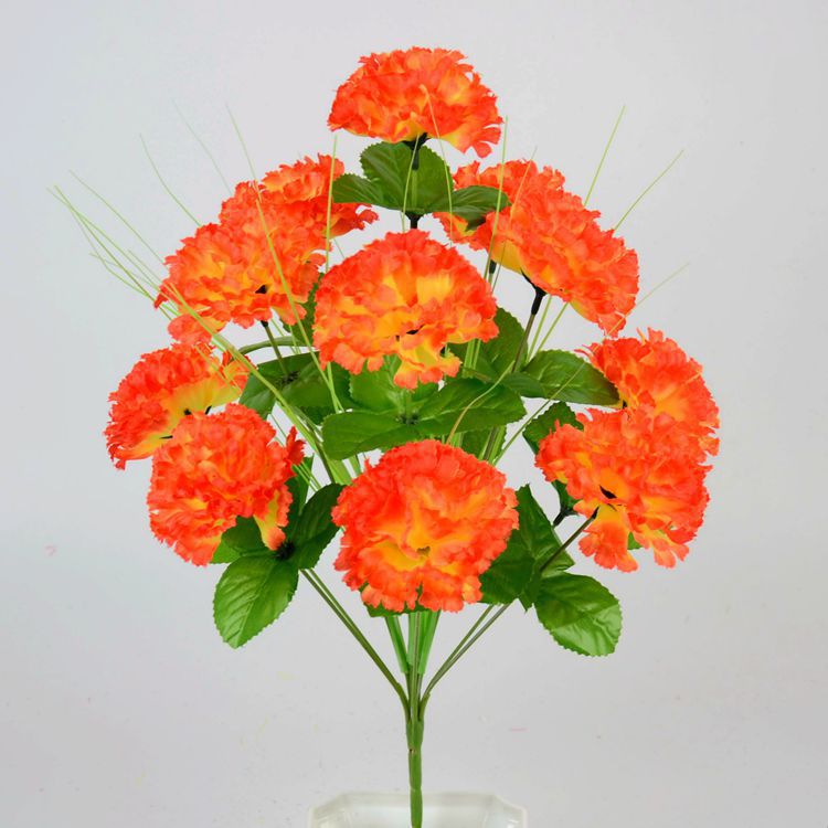 flores de seda colocadas en el cementerio del cementerio del cementerio de flores de 12 claves de fruta verde