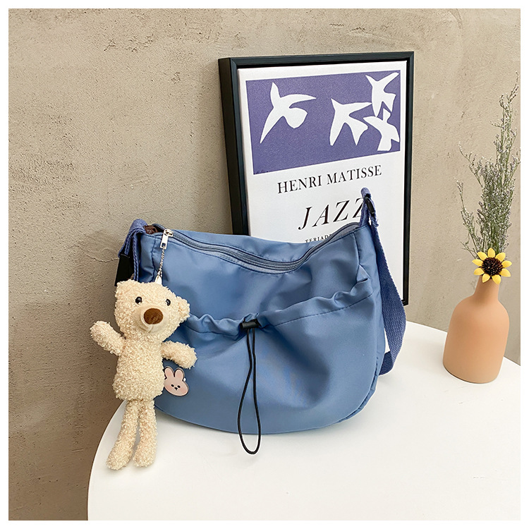 The new 2022 Little Bear canvas small bag for women is simple and versatile. The student dumpling bag is a trendy casual single-shoulder crossbody bag undefined