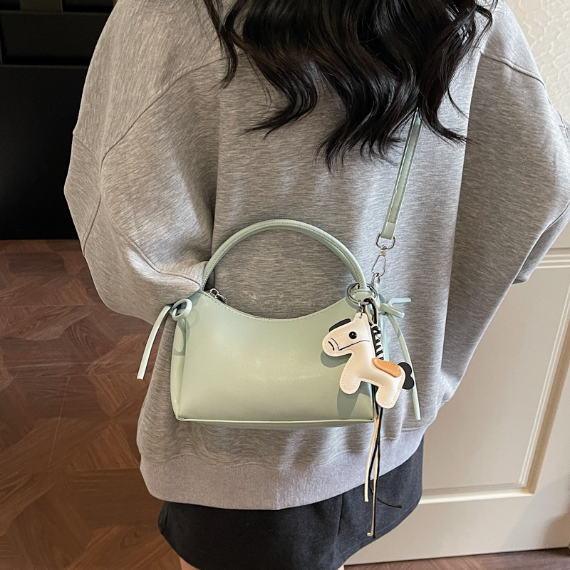 Meilade viento suave cuero brazo bolso para mujeres 2026 nuevo estilo de moda de viaje bolso de hombro sensación diaria simple mochila