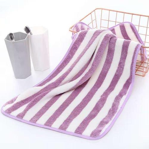Manufacturer wholesale warp knitted colorful striped coral velvet towel soft absorbent face towel cationic striped floor stall towel