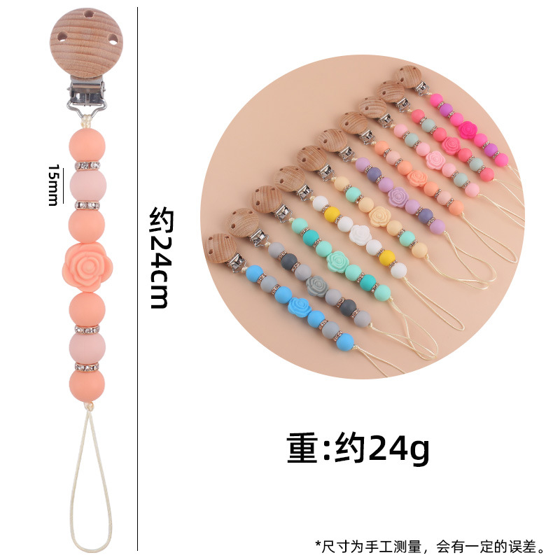 Nuevo bebé de dibujos animados de doble cara Rosa mordedor creativo DIY flash cuentas de ladrillo silicona mordedura pezón cadena anti-caída