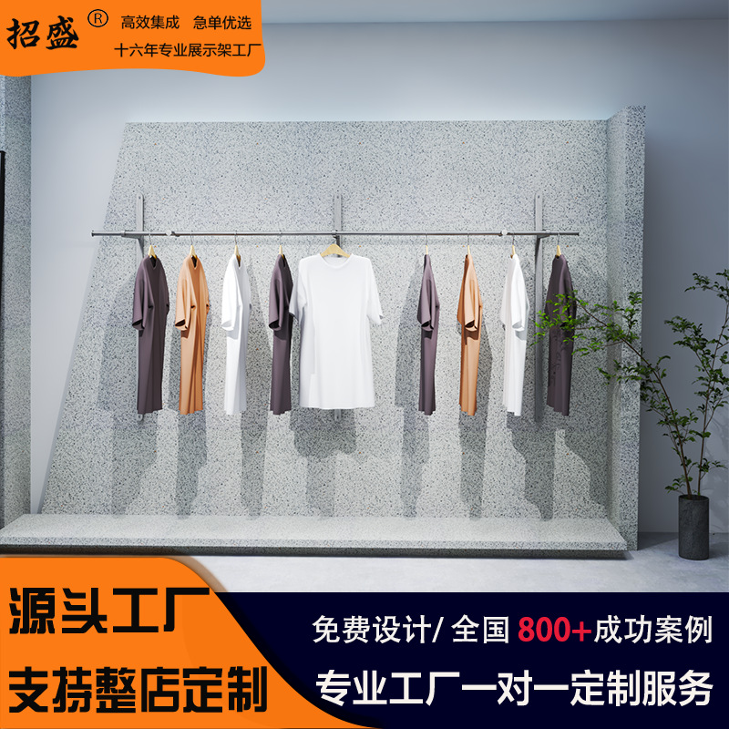 Tienda de ropa estante de exhibición profesional tipo piso estante de isla simple estante de carga de hombres y mujeres estante de exhibición de ropa de acero inoxidable
