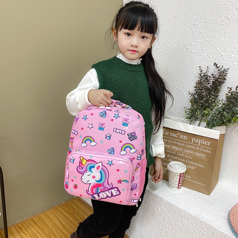 Mochila de jardín de infantes de comercio exterior para niños y niñas de 3 a 5 años de edad de dibujos animados de unicornio reducción de carga transfronteriza bolsa para niños
