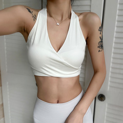 蝶結びのバンドの美背運動下着はフィットネスのブラジャーの深いvヨガのベストの外で専門のヨガの服を着ます。