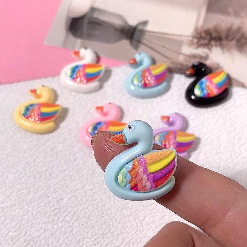 Nuevo colorido cisne diy accesorios de resina crema pegamento para el cabello clips para el cabello teléfono móvil agujero agujero hebilla hecha a mano al por mayor