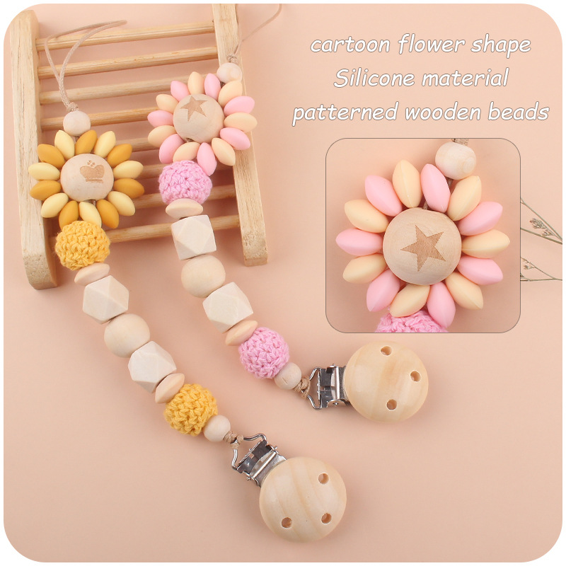 Bebé suministros chupete de madera clip creativo bebé patrón de cuentas de madera de dibujos animados flor chupete cadena Amazon nuevo