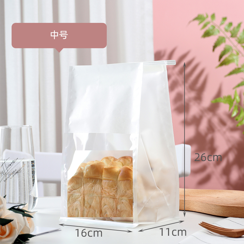 Bolsas de tostadas, bordes de alambre de hierro, sellado, pan rebanado, leche, dátiles, crispado de nieve, horneado transparente, punto oeste