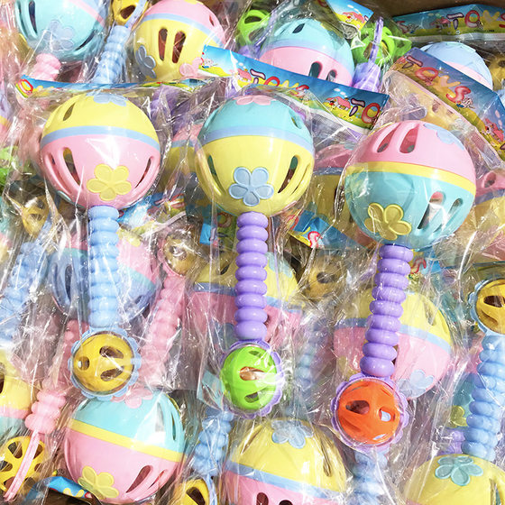 Children's plastic hand-held rattle large macaron ball rattle hand bell Linyi department store wholesale