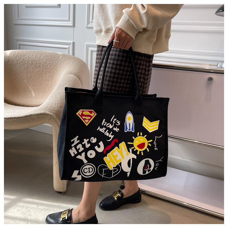 Fashion Printing Personality Canvas 2021 New Autumn Large Capacity Portable Female Bag display picture 7