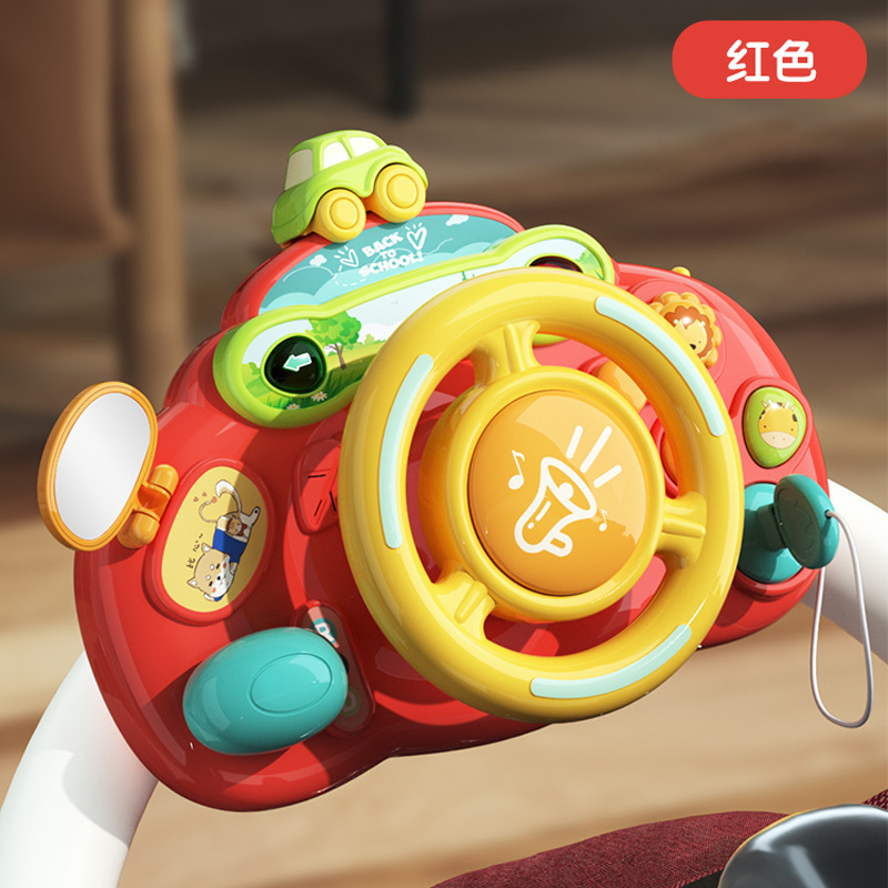 子供のハンドルのおもちゃはシミュレーションして車の後部座席の自動車の赤ちゃんの赤ちゃんの女性の男の子を運転します。