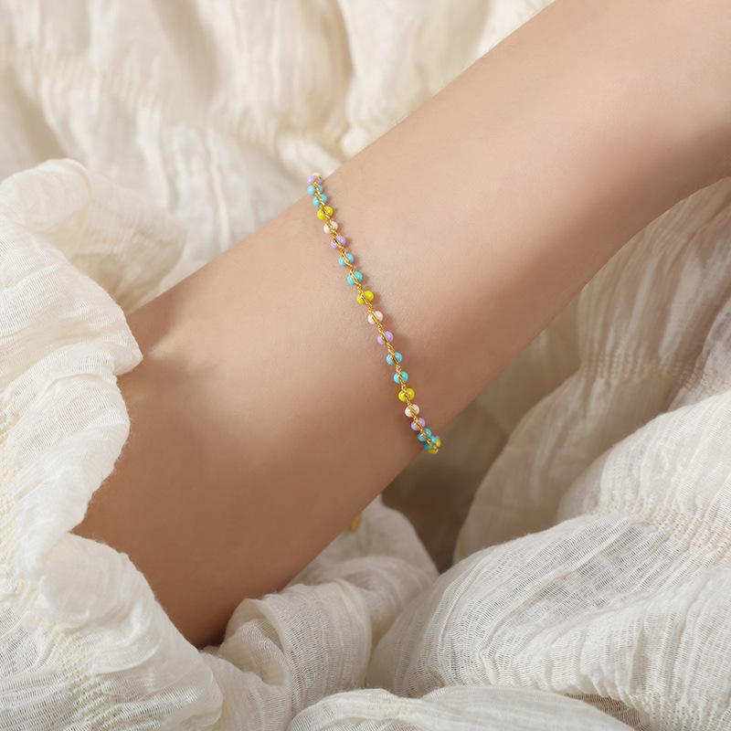 Luz de lujo personalidad nicho color eje colorido goteo collar de aceite de titanio acero todo fósforo de hadas temperamento pulsera joyería de moda para las mujeres