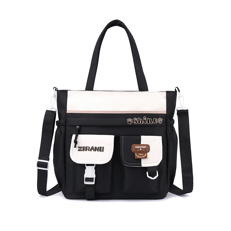Mochila escolar transfronteriza para niñas, versión coreana elegante, gran capacidad, ligera, que reduce la carga y protege la columna vertebral, mochila de doble asa para estudiantes de secundaria.