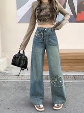 实拍2025春装新款胖mm大码女设计感做旧贴卡通补绣花牛仔阔腿裤