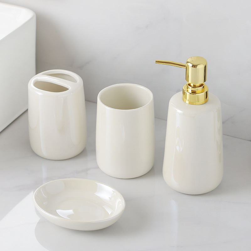 Kit de lavado de lujo ligero y alto valor de la cara botella de embalaje de baño blanco puro botella de emulsión de baño cerámica de cuatro piezas