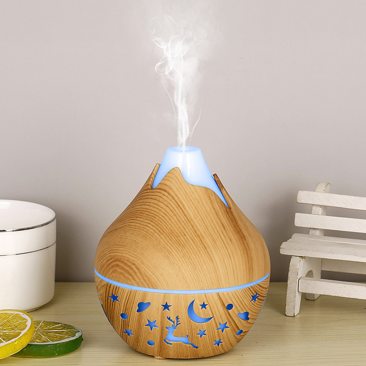 Mini humidificador hueco Xiaoxueshan-grano de madera claro