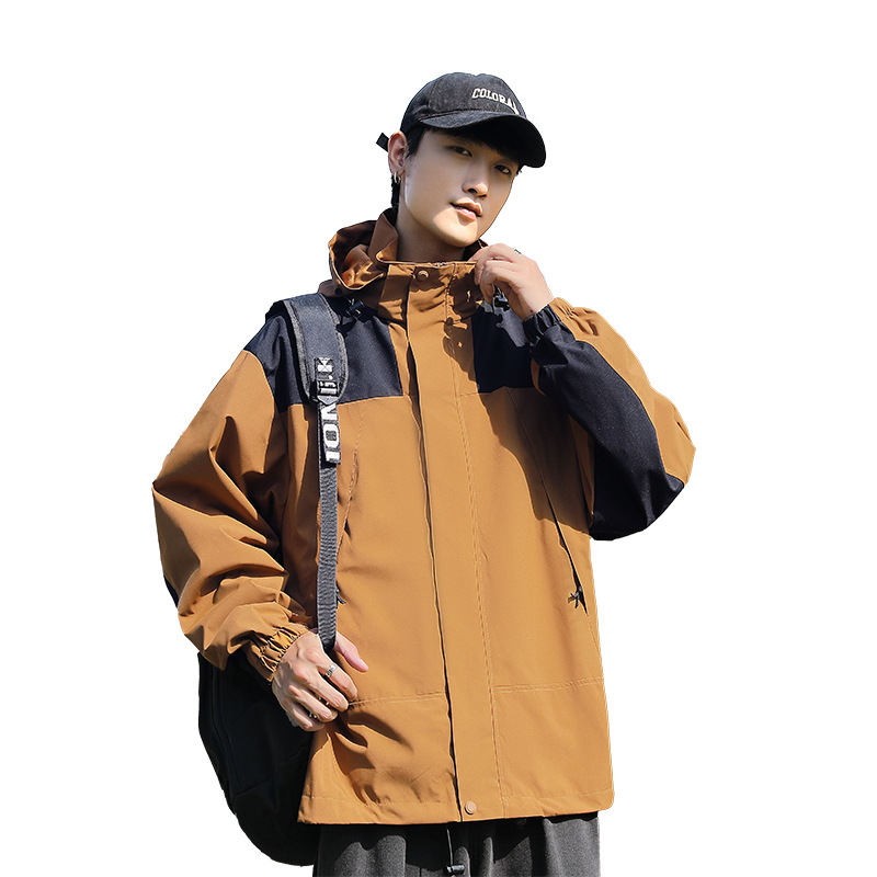 Primavera y otoño deportes al aire libre pareja de moda casual sombrero desmontable color a juego hombres y mujeres chaqueta delgada entrega en vivo