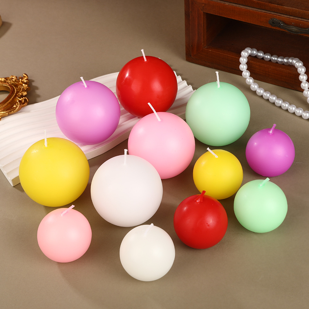 Creativa vela esférica de siete colores mayorista de bodas románticas sin humo para el hogar, bola redonda artesanal, pequeña caja de vela transfronteriza