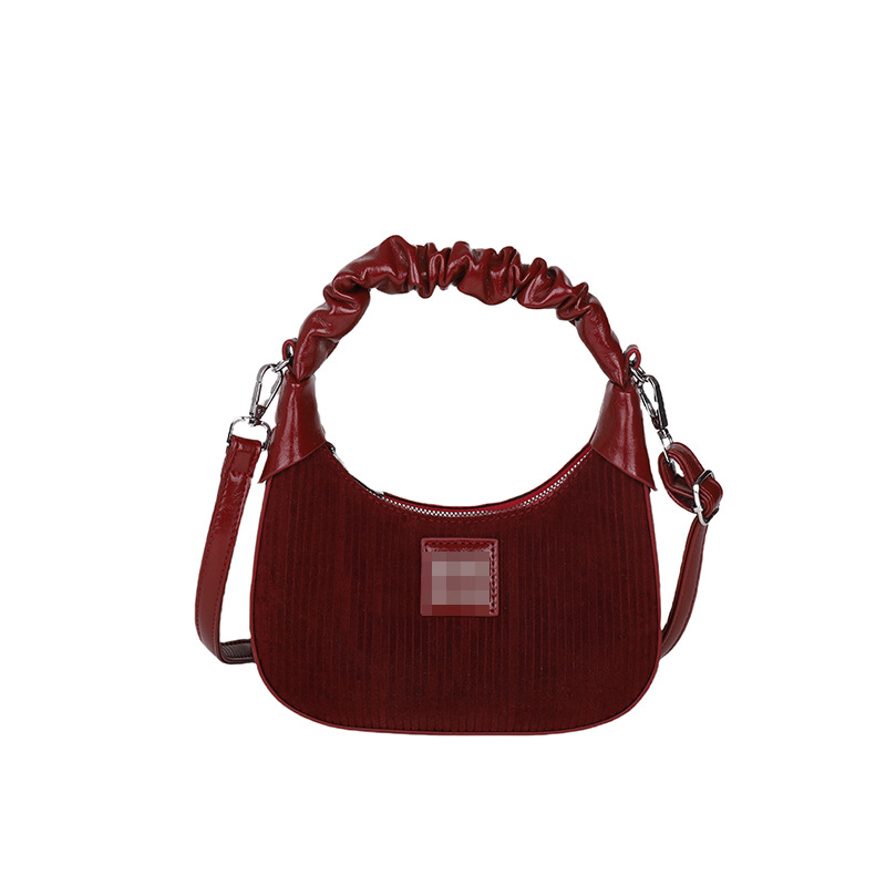 Bolsos de axila populares transfronterizos para mujer 2025 nuevo bolso de bola de masa de moda retro bolso de mensajero de un solo hombro plisado de terciopelo