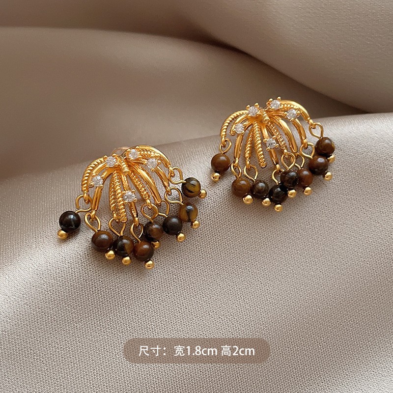 Pendientes de ojo de tigre artificial de color café Maillard con aguja de plata Pendientes simples y de moda de todo fósforo Pendientes ligeros de lujo de alta gama