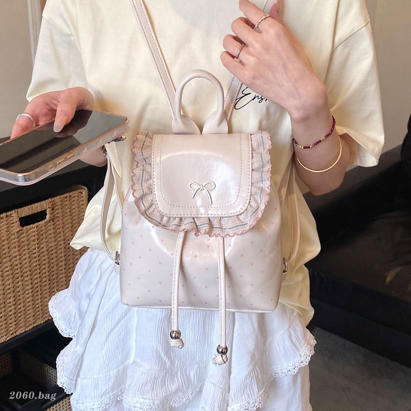 Mochila de estilo plateado de gran capacidad de viento de hoja de loto para mujeres nuevas olas de viaje de laterales de la mochila de estudiantes 2026 fiesta