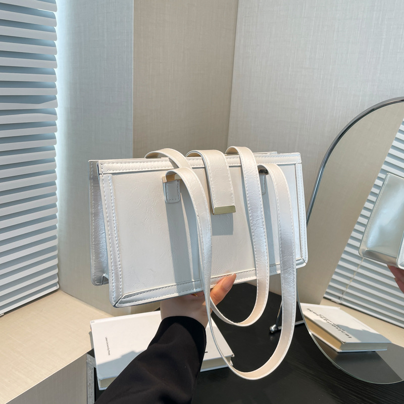 2024 otoño nuevo estilo retro tendencia de viaje bolso cuadrado minimalista diseño de moda personalidad brazalete bolso de hombro