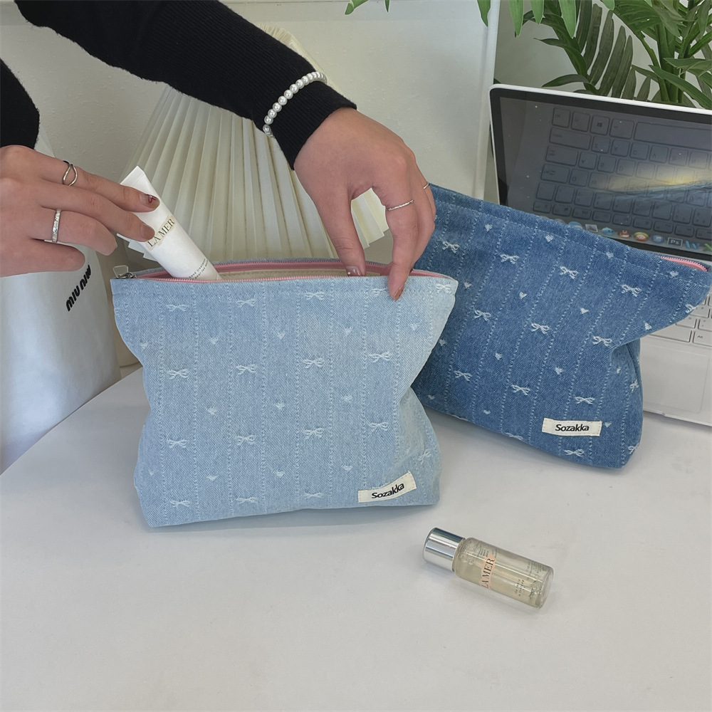416g Weight Canvas Lining Material Zipper Closure Type / Strap Type Cosmetic Bag Bags Type Holiday, Travel, Daily Occasion Denim Material Bag, Cattle, Knot, Butterfly, Bow Knot Pattern All Seasons Season Women's Gender Cute Style Square Shape Cute Bag Cattle Knot Denim Square Makeup Bags 11