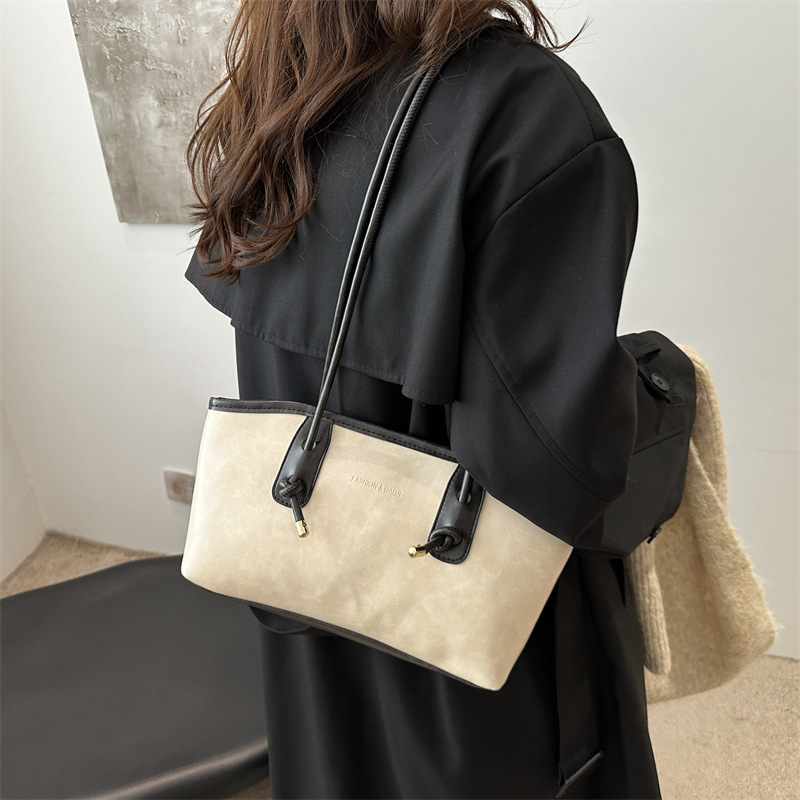 Commuting mujeres de color sólido 2024 nuevo otoño invierno retro moda texturas colgantes casuales de hombro bolso