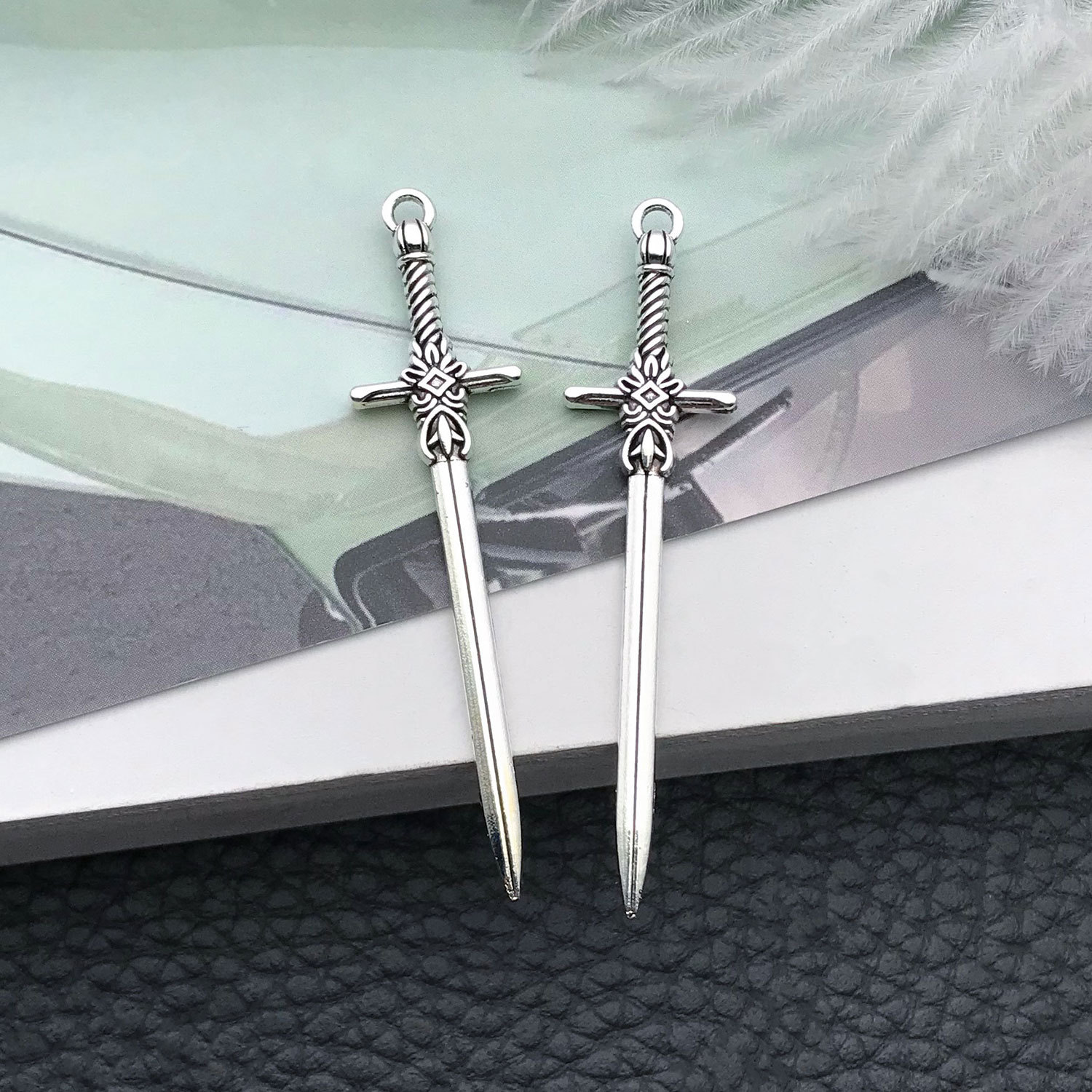 16192-古银锌合金刀剑12x49-1.6g