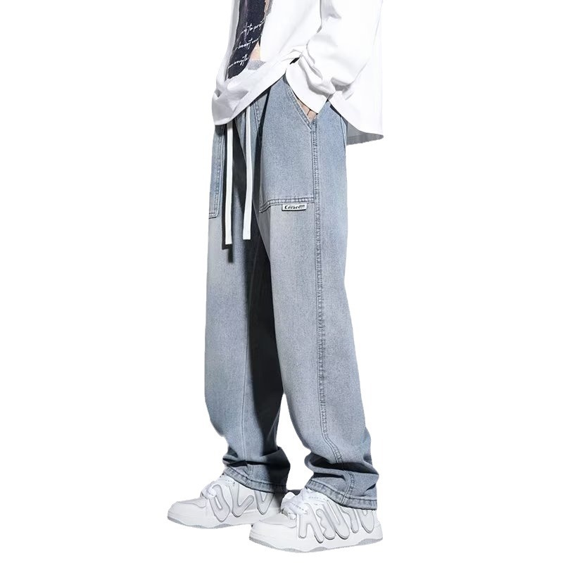 Pantalones casuales de primavera y otoño para hombres, estilo suelto de Hong Kong, sarga, pantalones de trapeador de pierna ancha de arte de moda, jeans deportivos