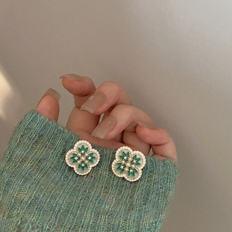 Pendientes de borla de flor de súper hada de plata Pendientes de ins pequeños frescos y dulces Personalidad de moda Pendientes de alta gama al por mayor