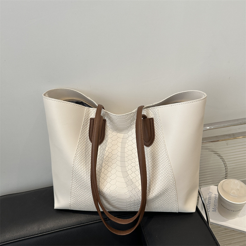 Bolso de gran capacidad con costuras de invierno 2025 Sensación de alta gama Todo-fósforo