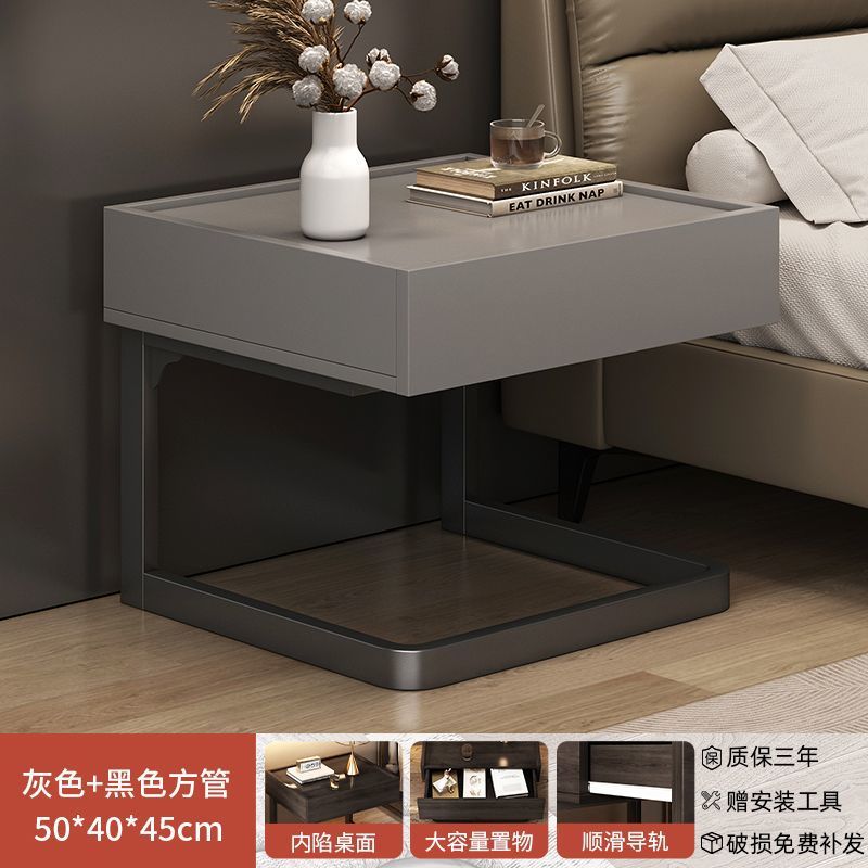 Taberna de cama flotante moderna simple lujosa alta sensación de dormitorio pequeño gabinete de almacenamiento junto a la cama pequeño gabinete creativo doméstico