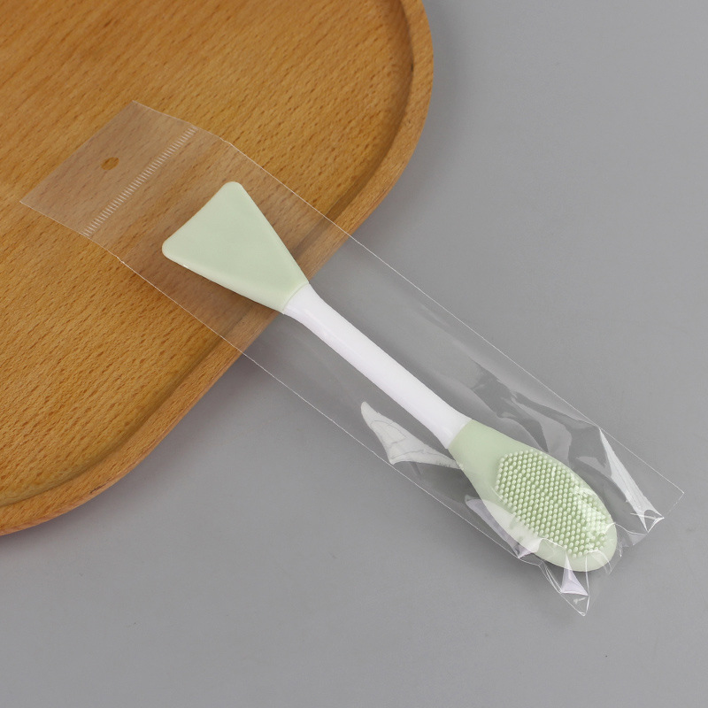 Cepillo de máscara de silicona de doble cabeza cepillo de lavado facial barra de cepillo de barro agitación de película ajustación barra de cepillo de doble propósito TPR cepillo de limpieza de cabeza de goma suave