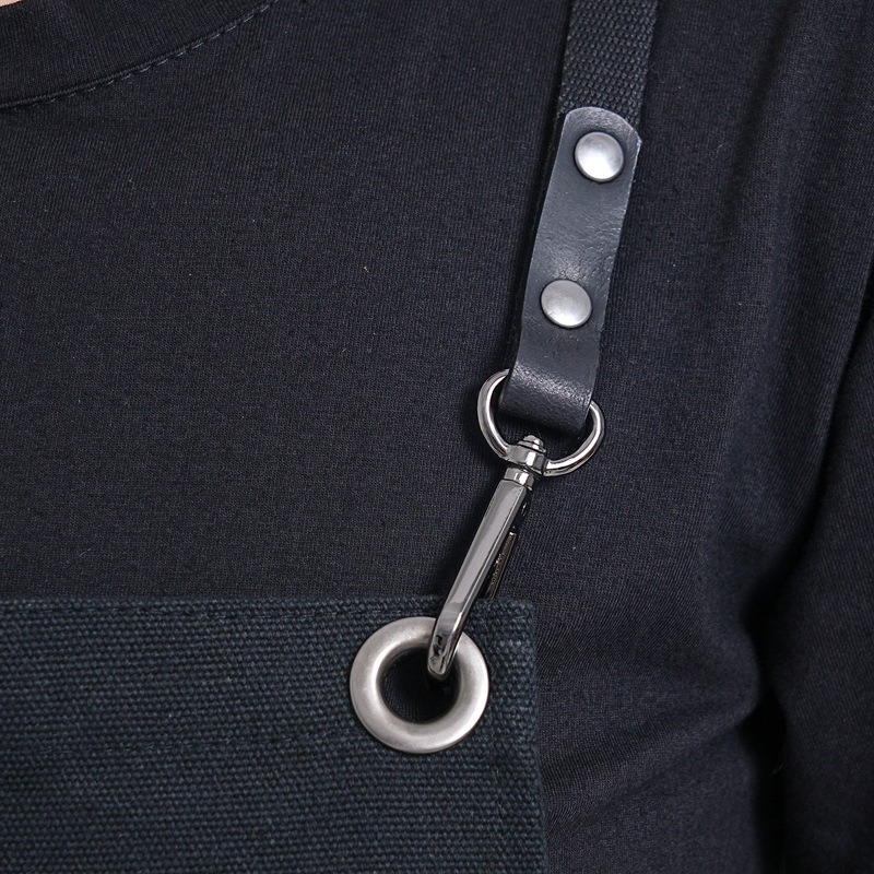 Amazon delantal de lona grueso logo personalizado sin mangas color negro sólido anti-contaminante anti-escaldado pelo delantal de ropa de trabajo