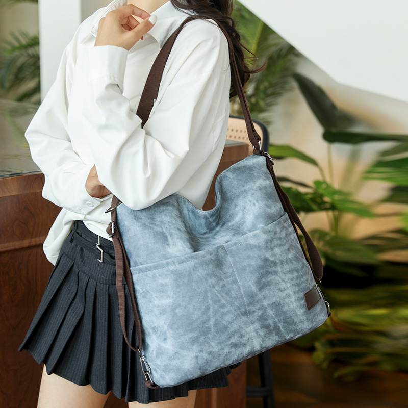 Nueva moda femenina 2025 nueva mochila de viaje de gran capacidad bolso de mensajero de todo fósforo bolso de hombro Tote