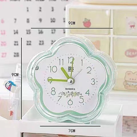 Ventas de fábrica simple reloj de alarma de plástico estudiante reloj de color caramelo con luz en forma de flor de dibujos animados fácil de llevar reloj de alarma