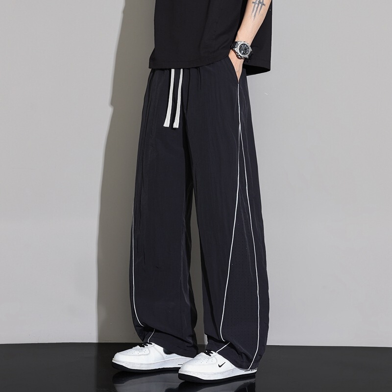 Cross-border wholesale American-style ice silk mesh sports pants for men, high street style, reflective stripe straight pants, trendy brand, loose wide-leg pants Cross-border wholesale American-style ice silk mesh sports pants for men, high street style, reflective stripe straight pants, trendy brand, loose wide-leg pants