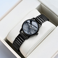 爆款简约中老年防水弹簧钢带高档石英表男女情侣款手表带日历腕表